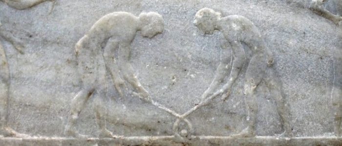 Relief von Hockeyspielern von 500 v. Chr. Relief ausgestellt im Nationalmuseum von Athen